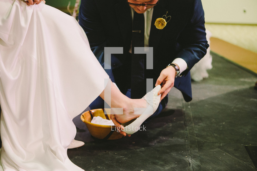 a foot washing ceremony at a wedding.
