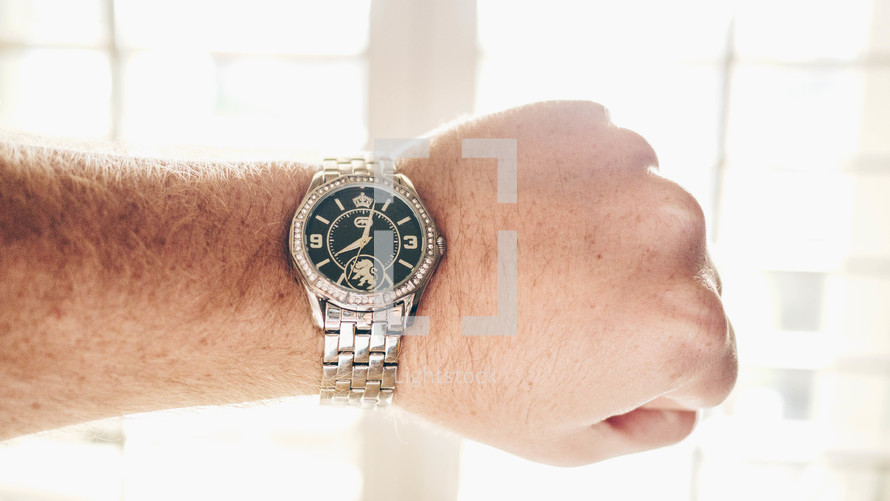wrist watch on a man's wrist 