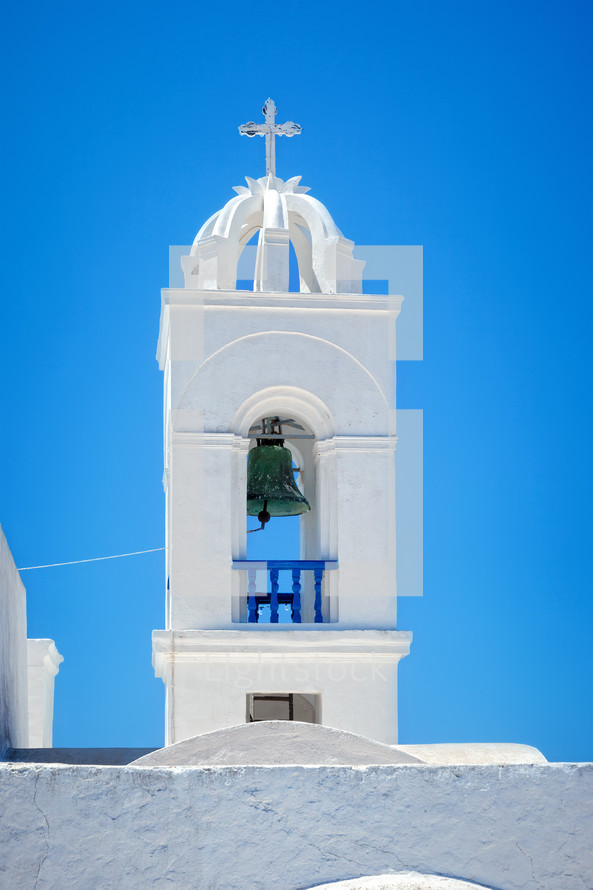 bell tower on a white steeple 