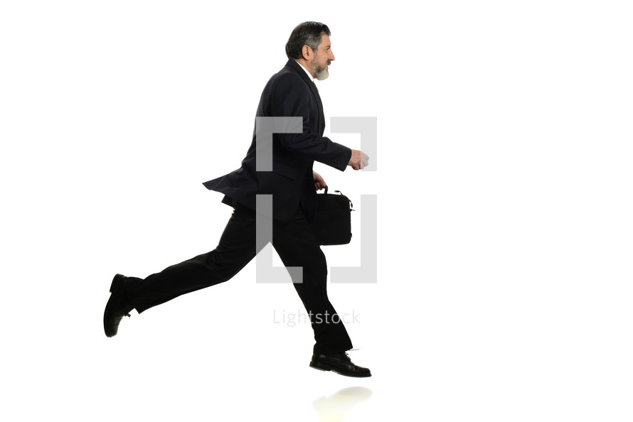 businessman with a briefcase running 