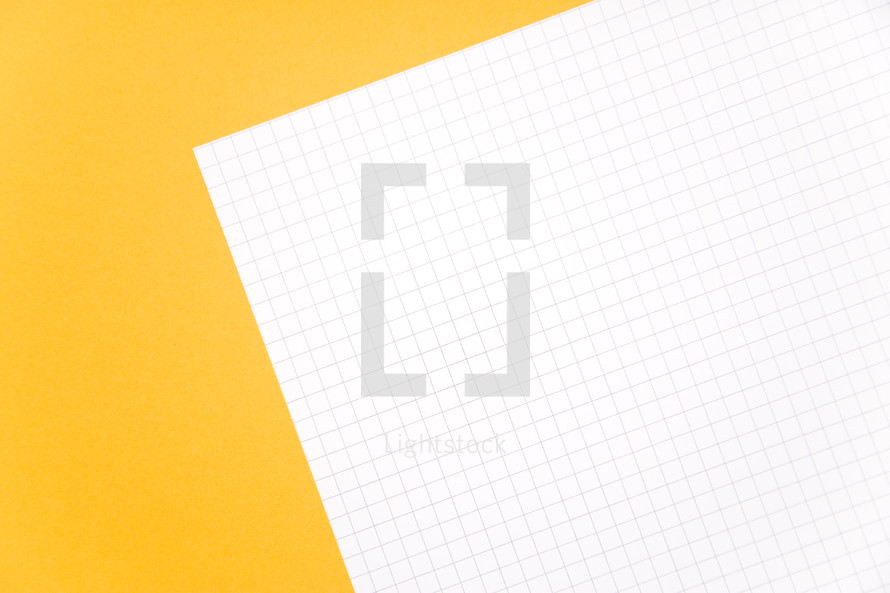 graph paper on yellow 
