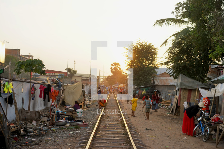 children playing near train tracks 