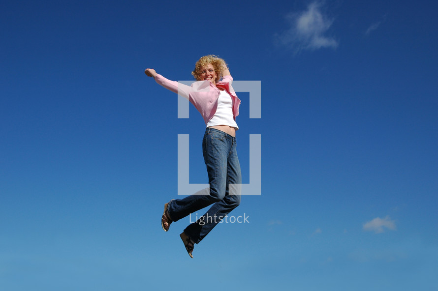 woman leaping in the air 