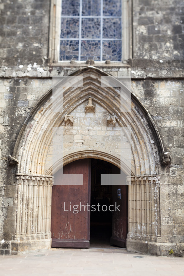 open door of an old church in France 