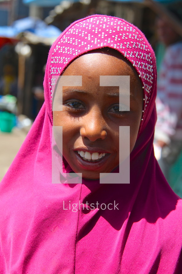 Shrouded muslim girl with broad smile [For similar search Ethnic Face Smile].