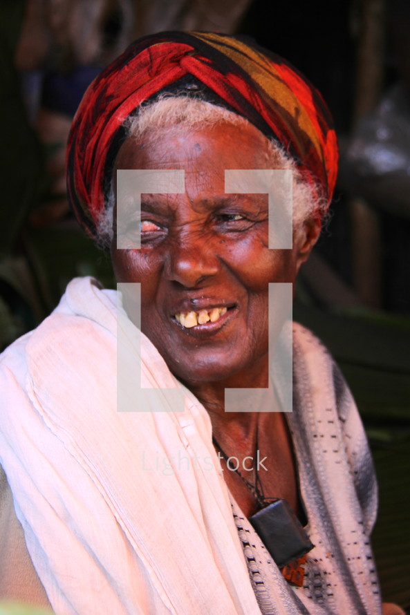 Face of an elderly tribal woman [For similar search Ethnic Face Smile]