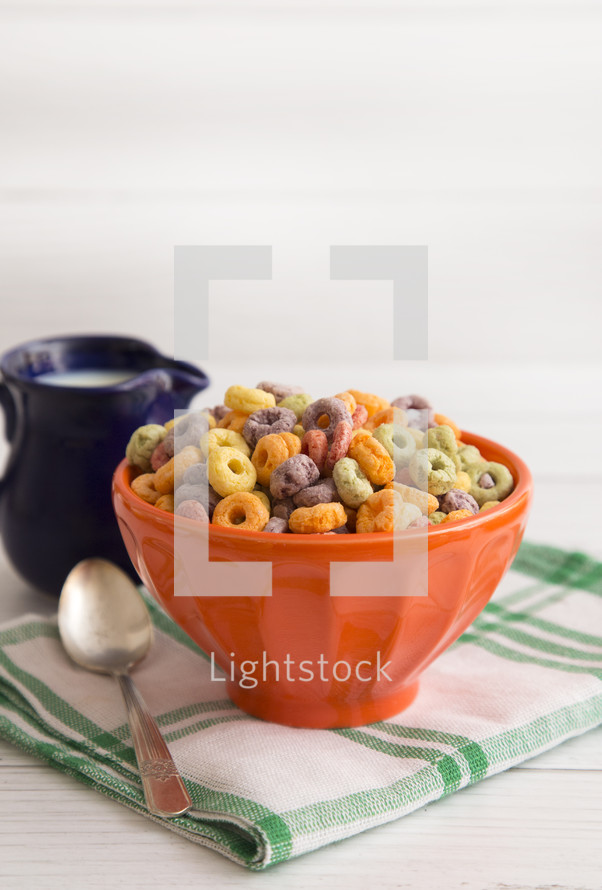 Bowl of Fruit Cereal on a Rustic Wooden Table