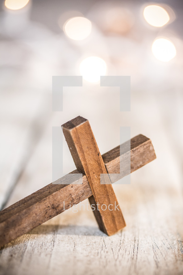 wood cross on wood boards 