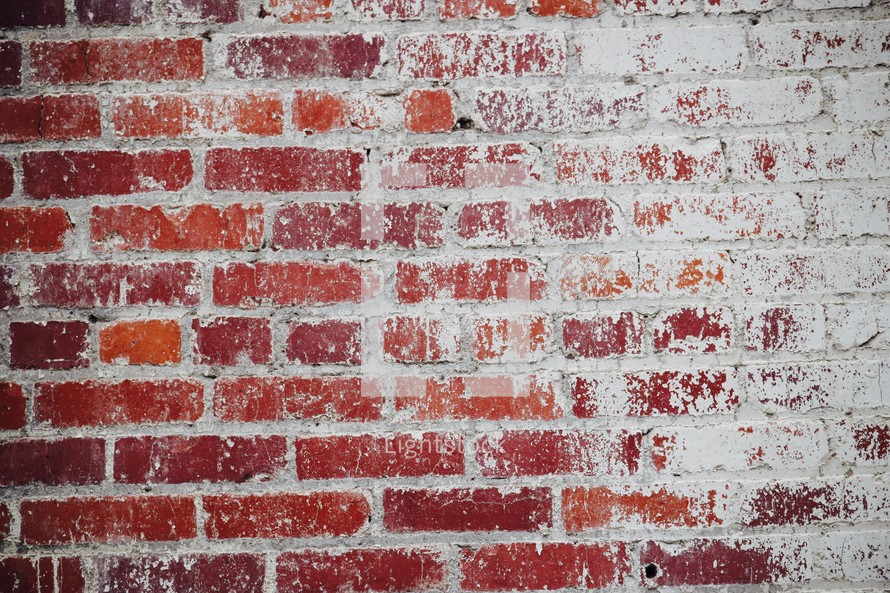 brick wall with white paint faded away background 
