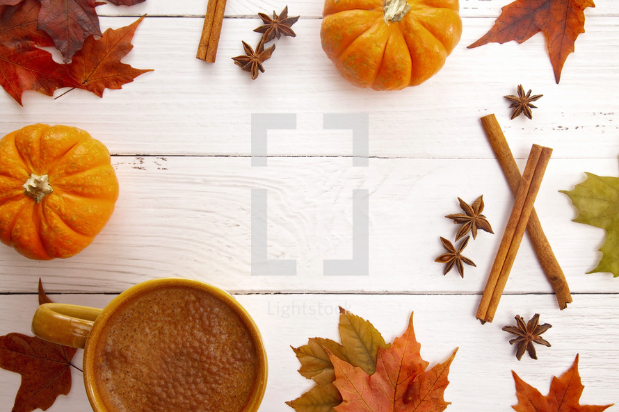A Fall Themed Border with Real Leaves Pumpkins Spices and Hot Latte