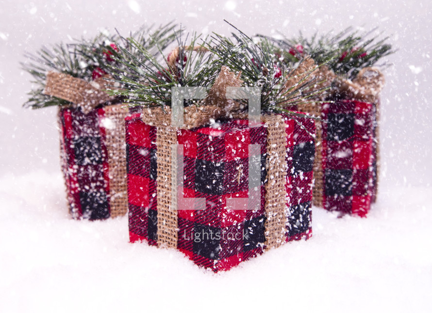 wrapped gifts in snow 
