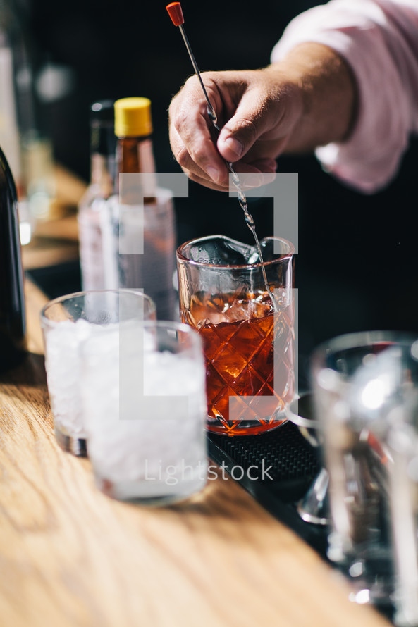 bartender mixing a cocktail 