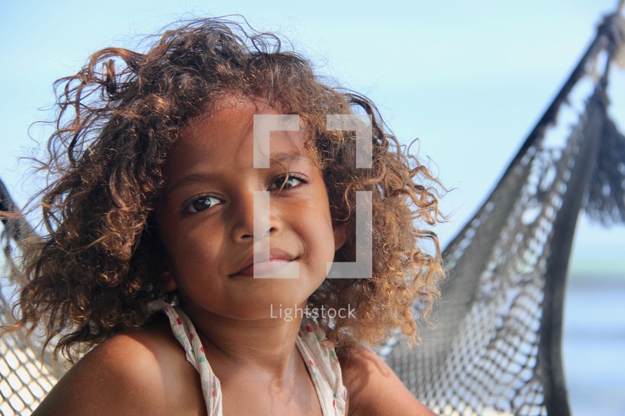 young girl with curly hair 