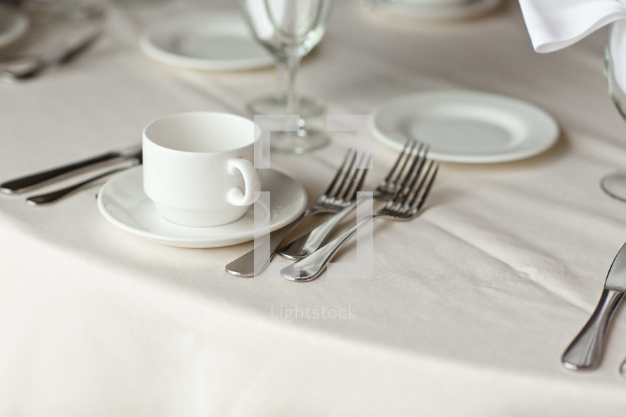 place settings on a table at a wedding reception 