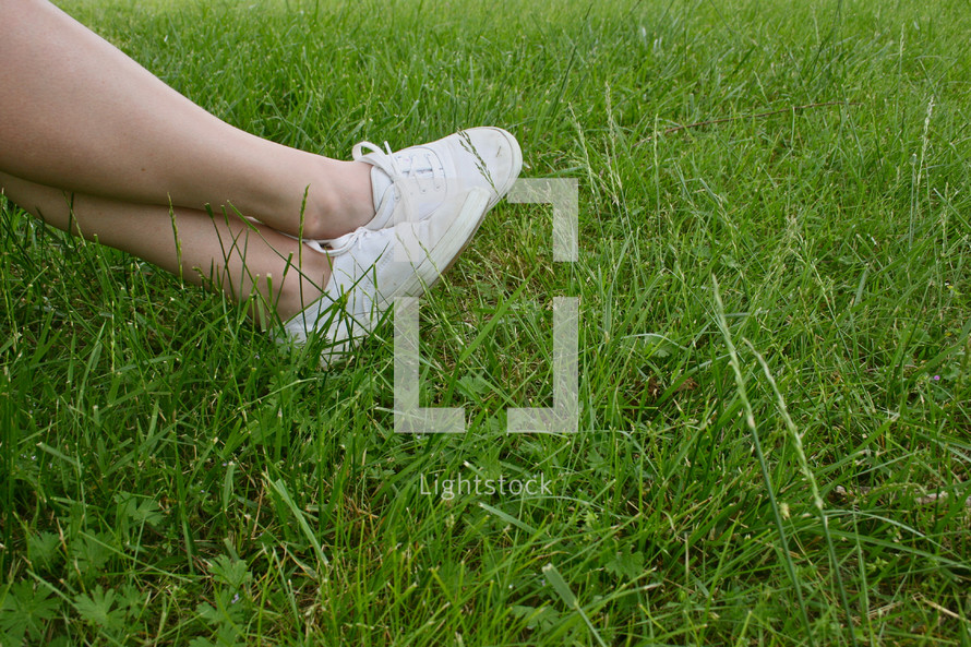feet in the grass