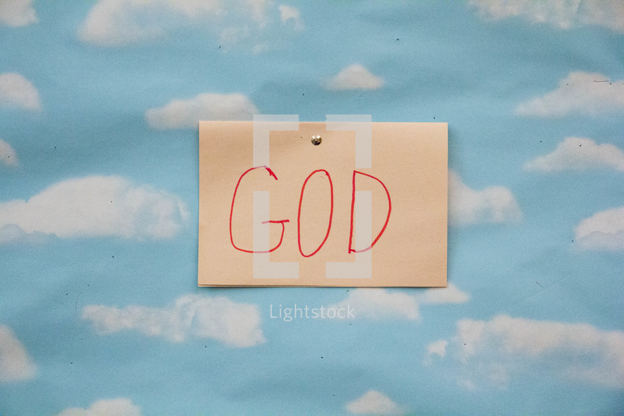 God sign against cloud background.