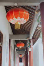 Chinese lanterns hanging from a ceiling 