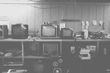 vintage tv's in a pawn shop 