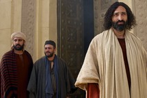 Jesus stands at the doors of a temple 