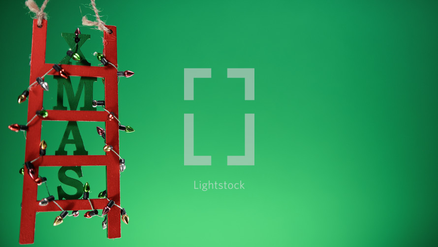 Christmas decoration ladder on green screen