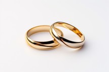 Sacrament: Matrimony. Wedding rings on a white background. close-up.