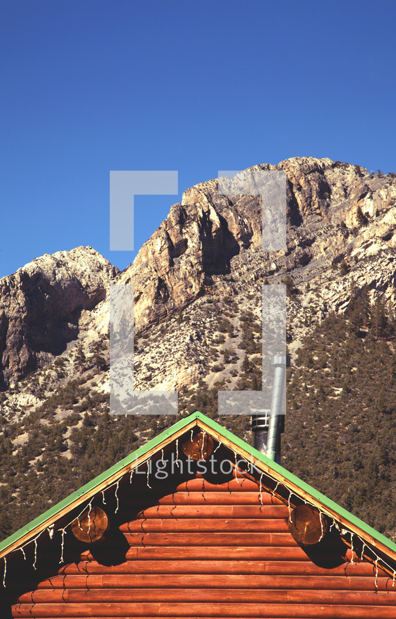 cabin roof and mountain peak 