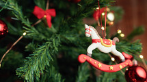 horse decoration hanging from a Christmas tree 