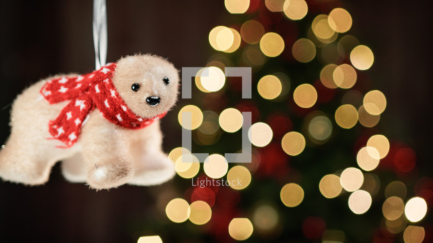 Bear Christmas decoration on tree background copy space
