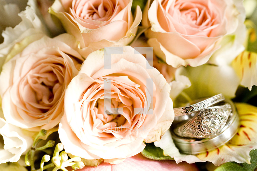 wedding rings and wedding bouquet 