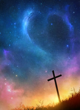 a cross under the night sky