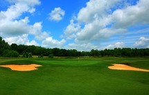 golf course under a blue sky