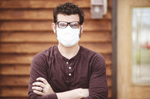 a man wearing a surgical mask 