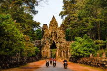 scooters and historic site in Southeast Asia 