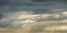 Light breaks through the skies in this Panoramic view