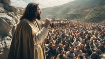 Jesus preaching the good news to the crowd.