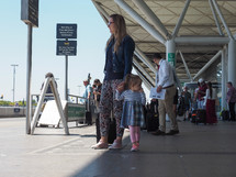 STANSTED, UK - CIRCA JUNE 2018: Travellers at London Stansted airport design by architect Lord Norman Foster