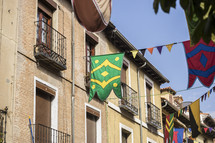 banners hanging between buildings 