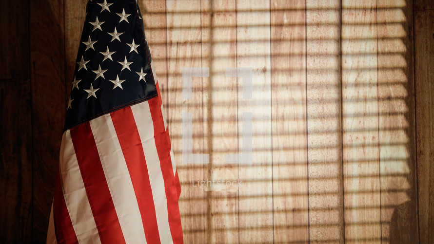 American Flag on the wooden wall of the room