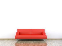 red sofa against a white wall 