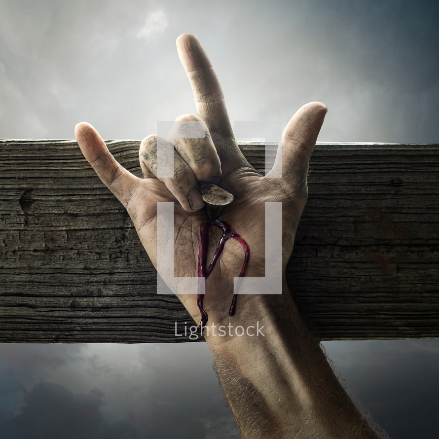 The hand of Jesus on the cross showing the sign for "I love you" in sign language.