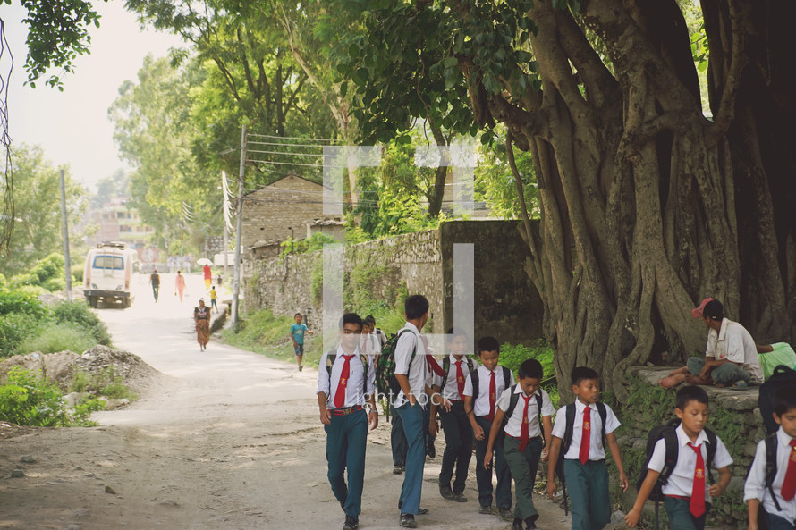 school boys walking to school in Nepal 