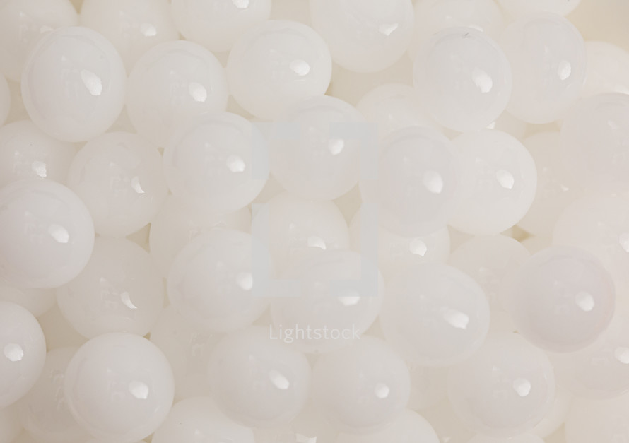 Small white shiny beads