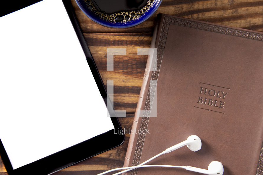 Tablet with a Bible for LIve Streaming Church Services or Bible Study