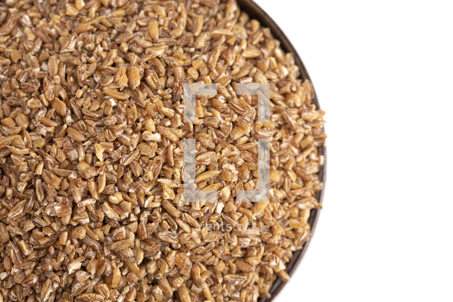bowl of grains on a white background  