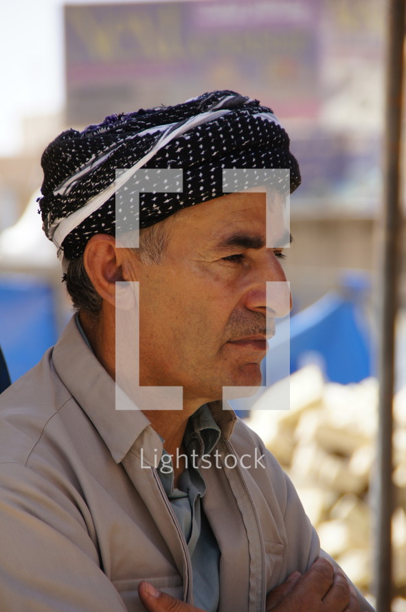 Kurdish Man with traditional headdress 