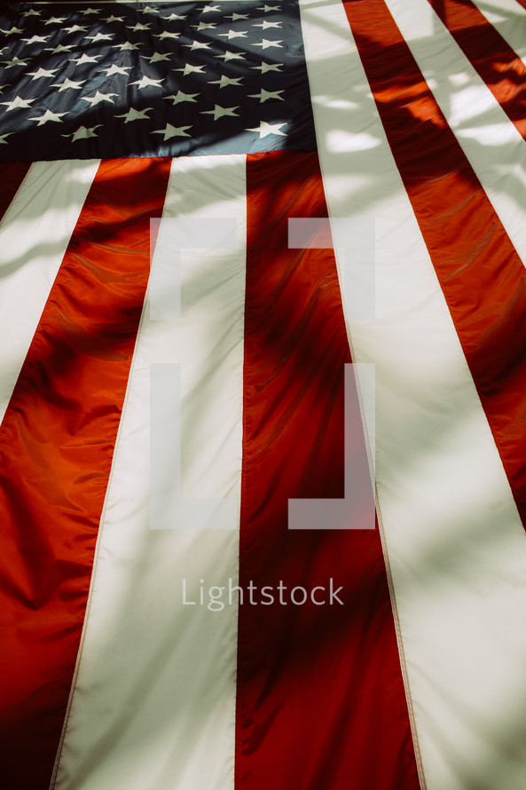 shadows on an American flag 