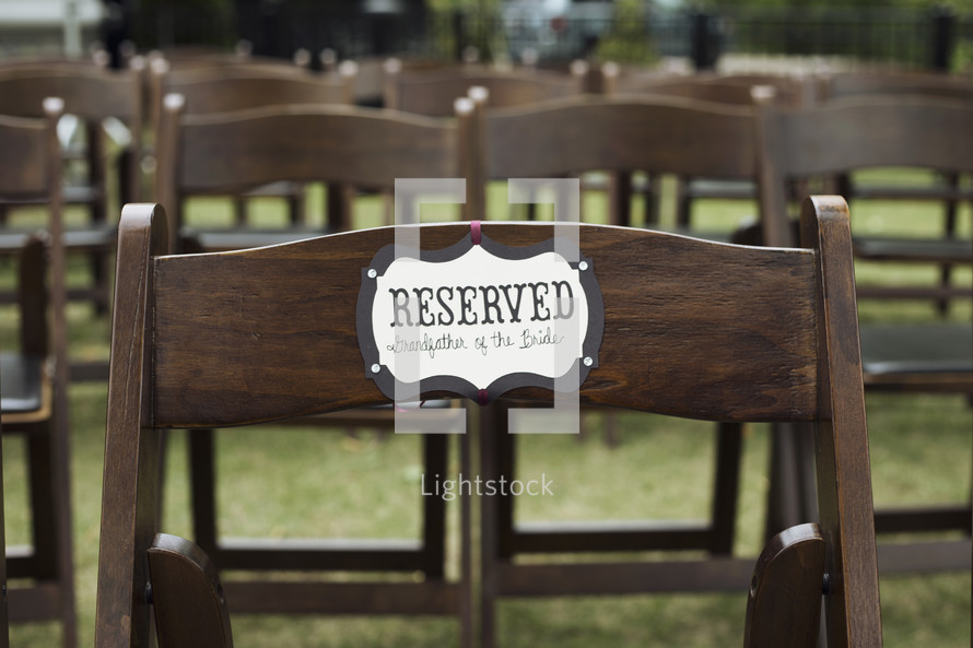 reserved chair at a wedding