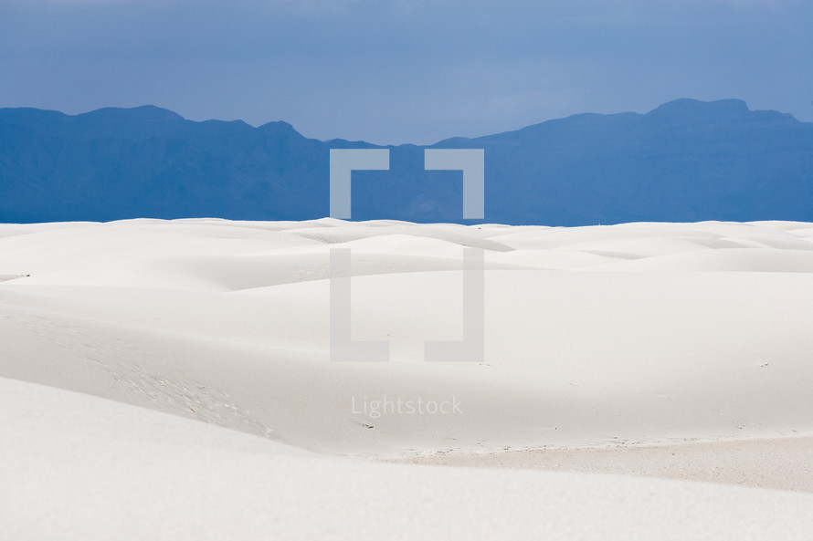 White Sand Dunes and Blue Mountain Silhouette