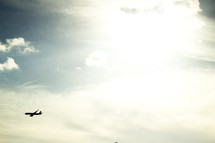 silhouette of a plane in flight 