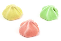 three different colored meringues